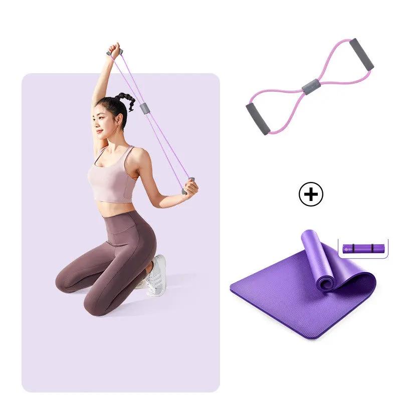 Thickened non-slip yoga mat with resistance band and accessories for home dance exercises.