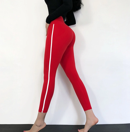 Red fitness pants designed for optimal comfort and flexibility during yoga and workouts.