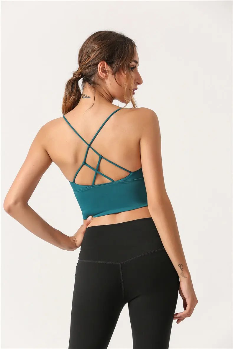 WILKYs0Beauty back yoga fitness vest
 Product Category: Vest
 
 Fabric composition: nylon / nylon
 
 Color: Dai blue, emerald green, plum red, turmeric
 
 Size: S, M, L, XL
 
 Applicable scenes: runnin