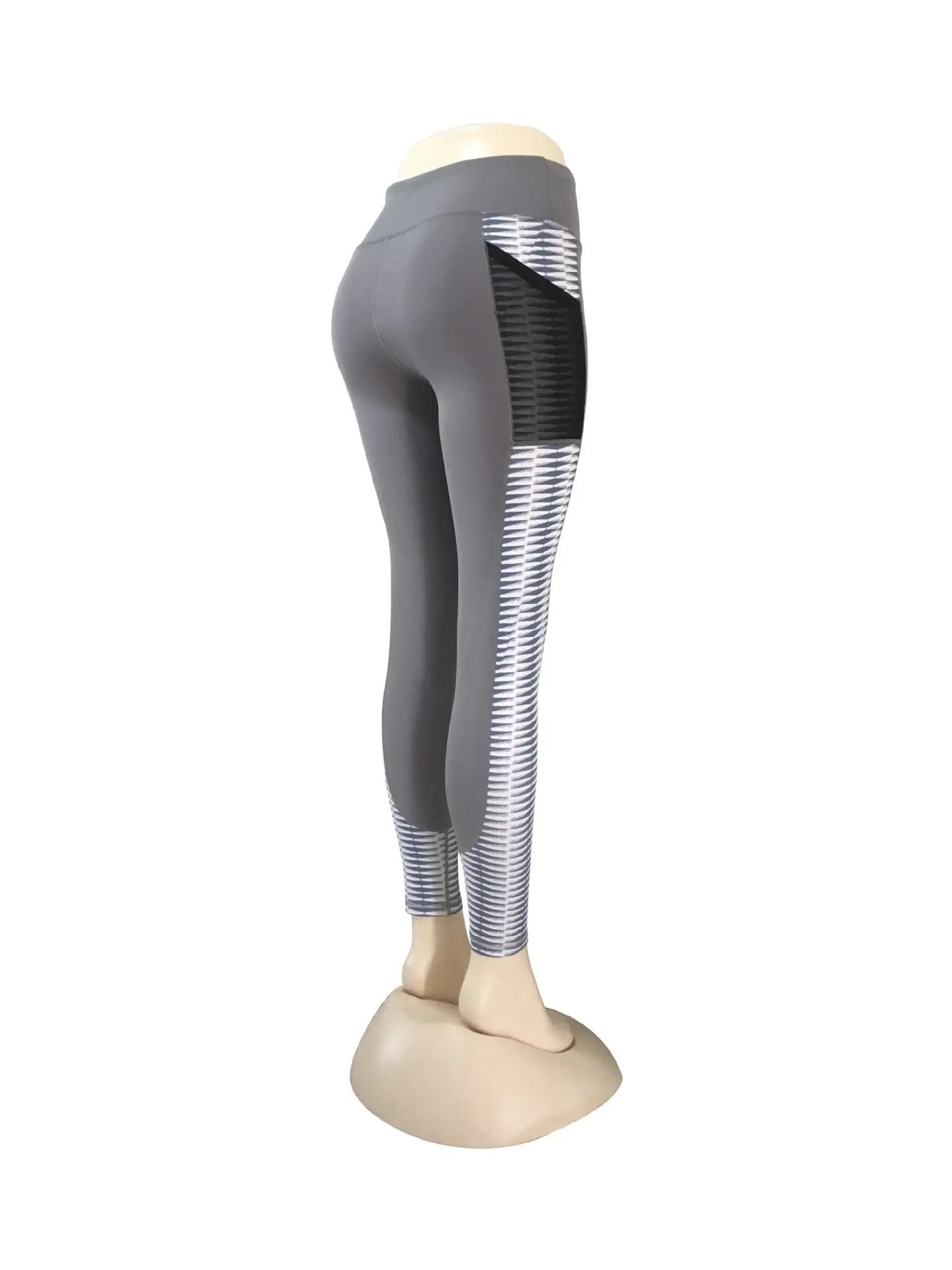 Gray yoga running fitness pants with stripe design, available in multiple sizes.