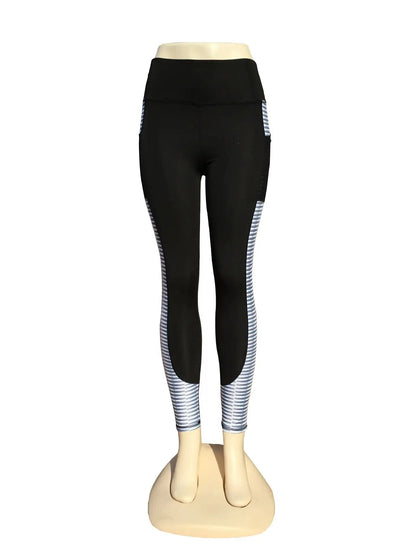 Black yoga running fitness pants with white stripe detail, made from hemp blend fabric. Available in sizes S to XL.