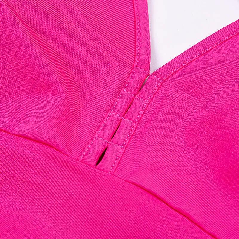 Close-up of pink Yoga Hollow Fitness Vest fabric emphasizing its cotton composition.