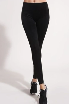 Black yoga fitness pants for women shown on model.