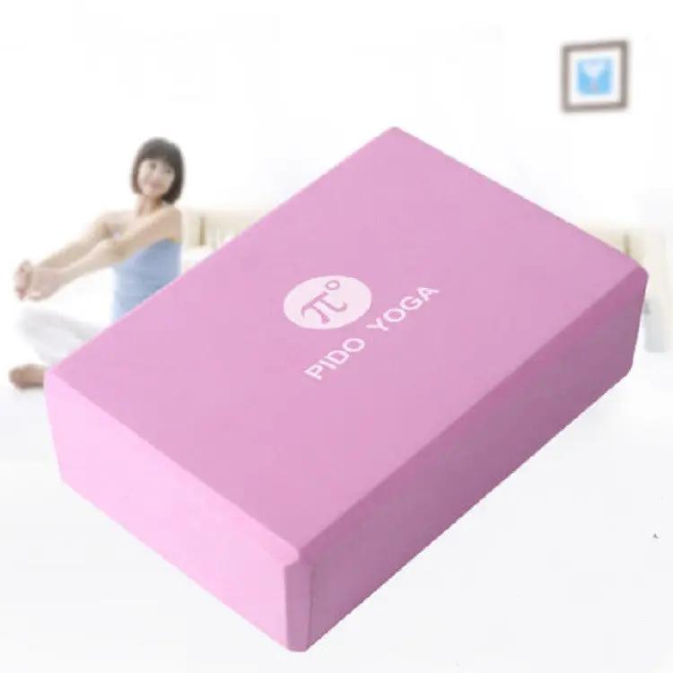 Fitness dance aids yoga brick in pink, ideal for enhancing flexibility and strength in yoga and dance routines.