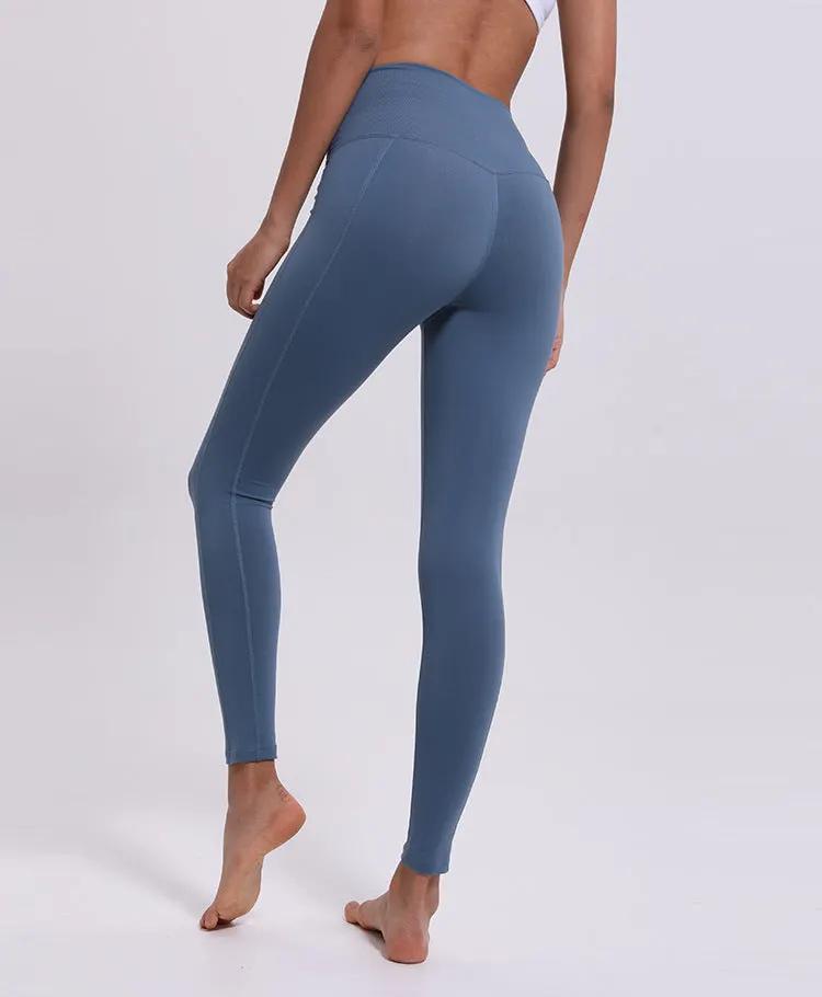 Women's fitness yoga cropped trousers in blue, high-waist design, ideal for running and sports activities.