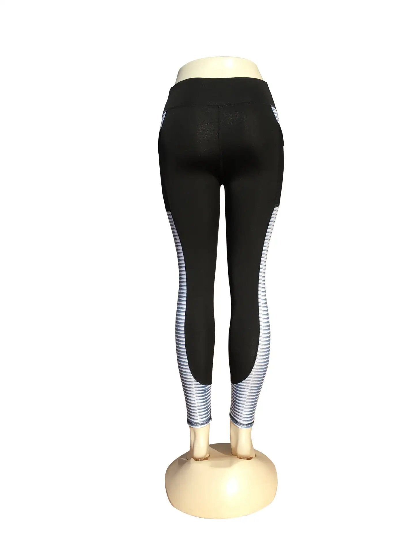 Black yoga running fitness pants with striped detailing on calves.