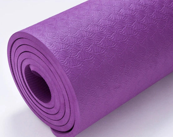 Purple Eva Yoga™ Non Slip Yoga Mat with textured surface for stability and cushioning in workouts.