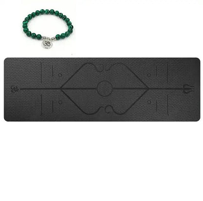 Eco-friendly TPE yoga mat with printed position line and bracelet accessory.