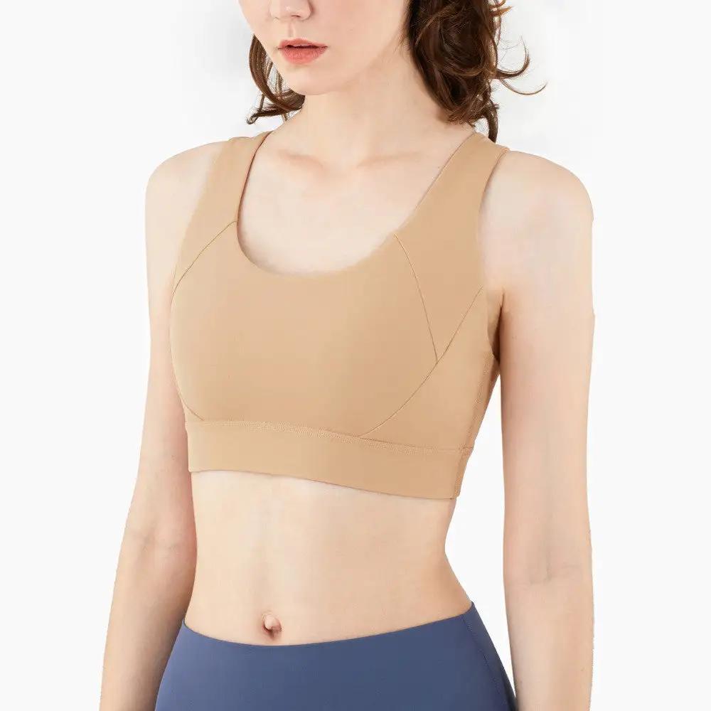 Fitness sports underwear yoga bra in beige, made from NULS Air fabric, nylon composition, suitable for various sports activities.