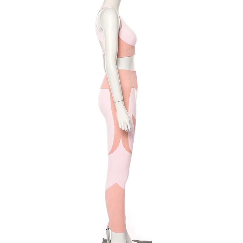 Slim Seamless Yoga Fitness Set in pink and white, side view.