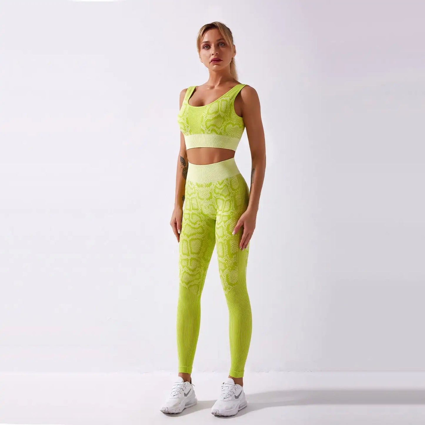 Women's snake pattern sports yoga fitness suit with nylon blend fabric, suitable for winter, spring, and autumn.