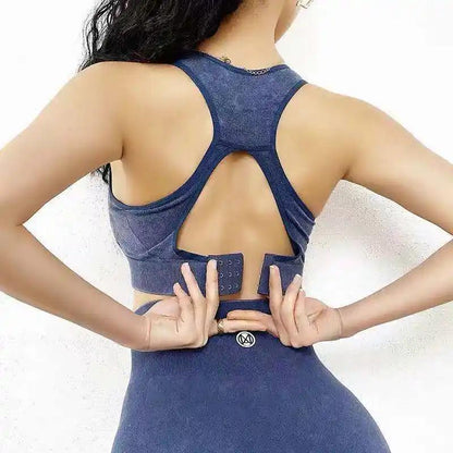 Running shockproof gathers vest-style anti-sagging fitness yoga bra in sand washed blue, back view.