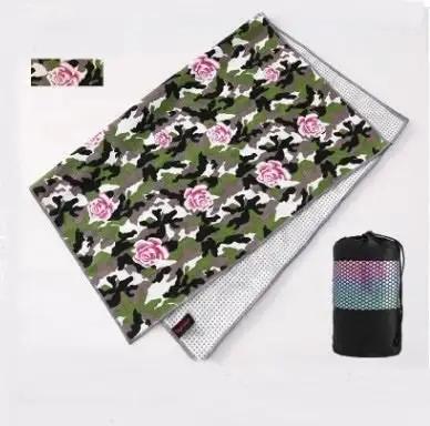 Tie-dye yoga blanket pad towel with floral design, shown with storage bag.