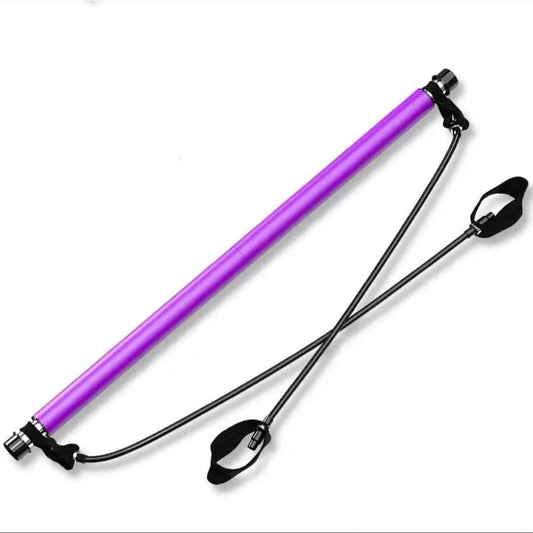 Purple Pilates bar with elastic rope for home fitness and yoga exercises.