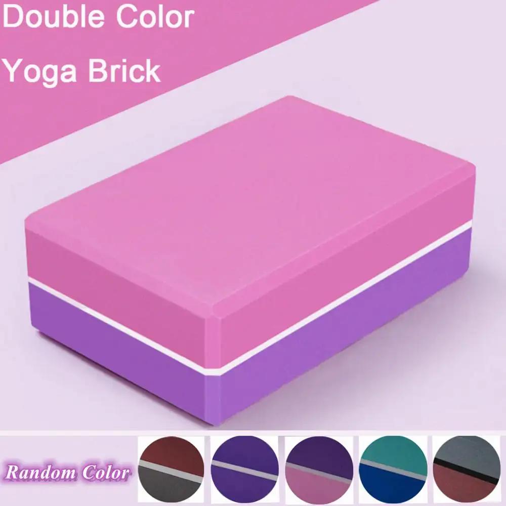 Two-color yoga brick with dual-colored design, EVA material, and supportive structure for enhanced yoga practice.