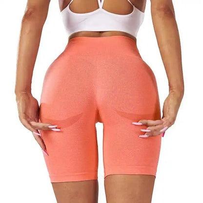 Women's Yoga Shorts Fitness Pants in peach color, made of spandex and nylon blend, suitable for sports and activewear.