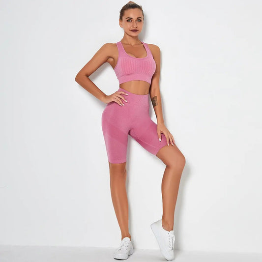 Women's Fitness Suite Yoga Suit in light bean paste, featuring a sleeveless design with corset pants for enhanced movement and comfort during yoga and fitness activities.