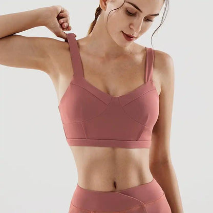 Woman wearing pink fitness yoga underwear made from nylon.