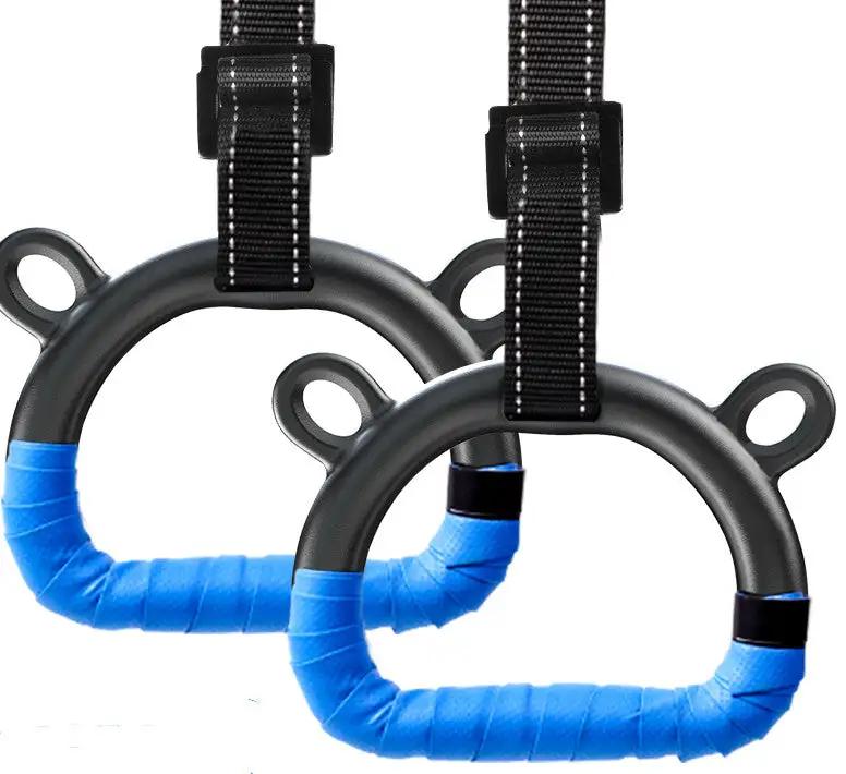 Children's home fitness rings with blue grips and black straps for exercise.