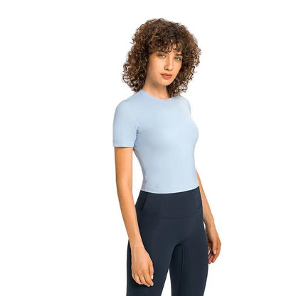 WILKYs0Elastic Breathable Fitness Yoga Wear
 Product information:
 
 Product category: T-shirt
 
 Function: Super flexible
 
 Fabric: Nylon
 
 Color: White, salt water blue, green gray, coral powder, pearl ye