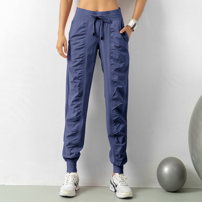 WILKYsPantsFashion Casual Sports Pants For Women Drawstring High Waist Trousers WExperience ultimate comfort and style with our Fashion Casual Sports Pants for Women. Designed with a drawstring high waist, and pockets, these pants are perfect for