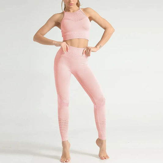 Women's pink fitness yoga outfit set, featuring a sleeveless top and high-waisted leggings.