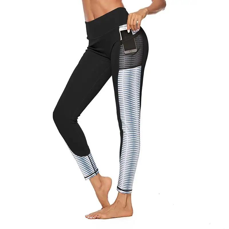 Black yoga running fitness pants with striped design and phone pocket.