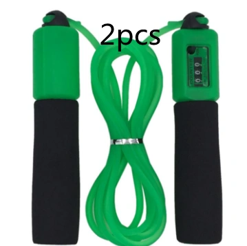 Green rope skipping fitness rope with black sponge handles.