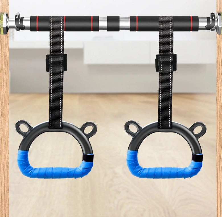 Children's home fitness rings with blue handles and adjustable slings in a doorway setup.