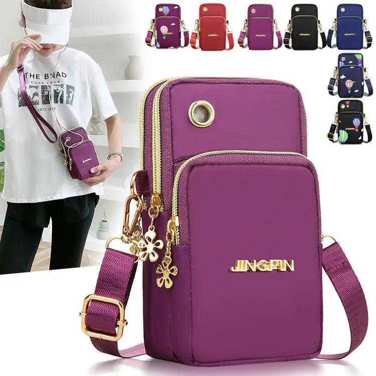 WILKYs0Mobile Phone Bag Women Shoulder Bag 3-layer Zipper Design Small Crossb
 Product information:
 
 Material: Nylon
 
 Opening method: zipper
 
 Internal structure of the packet: card slot
 
 Bag shapes: square vertical section
 
 Applicab