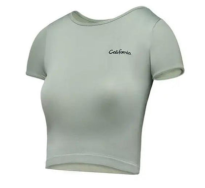 Yoga fitness short sleeve top with "California" logo, light green color, nylon material.