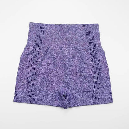 High stretch yoga fitness shorts in purple with a seamless design, perfect for maximum flexibility and comfort.