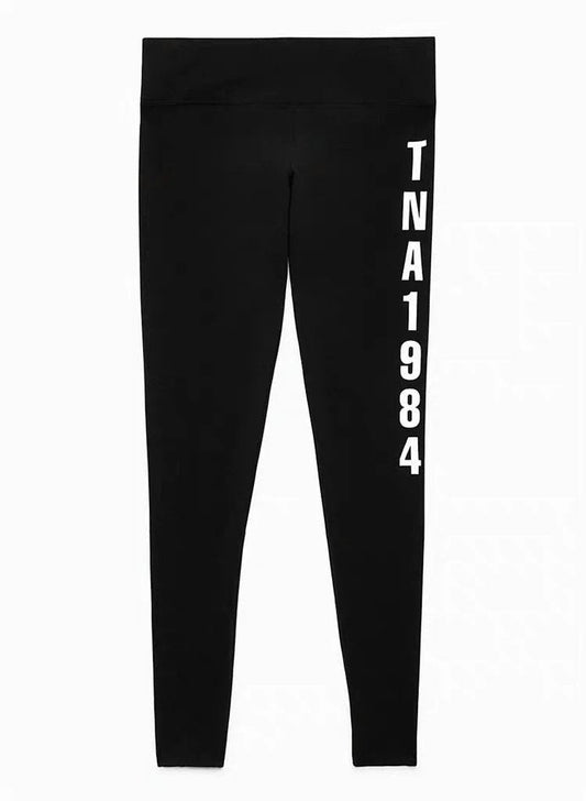 High elastic yoga fitness leggings with TNA 1984 print, black.