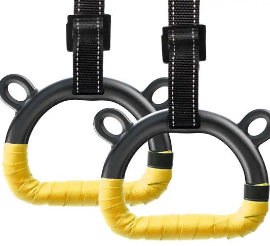 Children's home fitness rings with yellow handles and black straps for exercise.