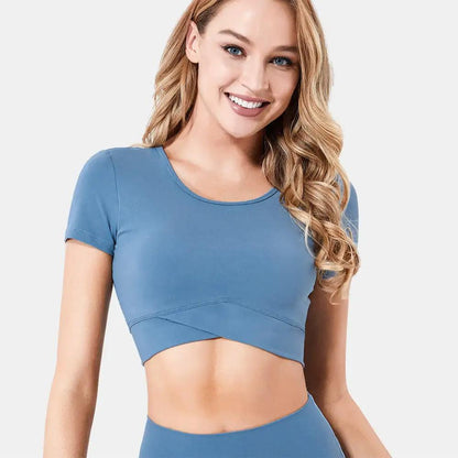 Blue quick-drying fitness yoga top made from nylon/Lycra fabric.