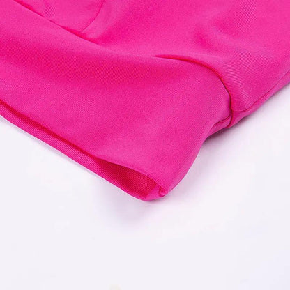 Close-up of pink Yoga Hollow Fitness Vest fabric showing texture and stitching.