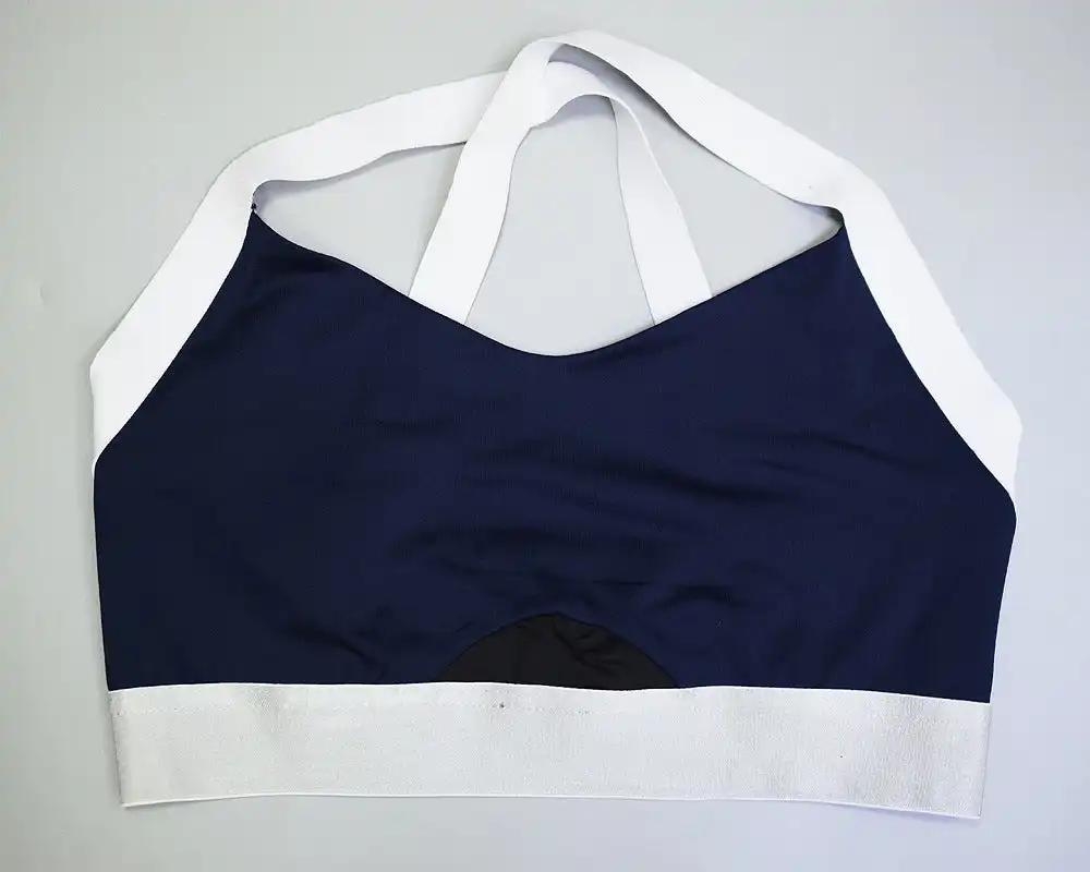 Offset yoga fitness vest in polyester fiber material.