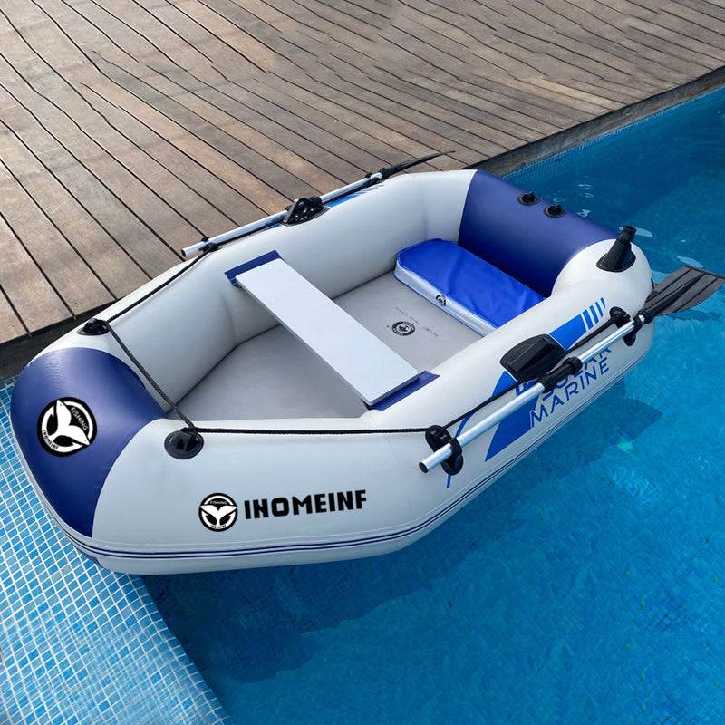 Rubber boat with thickened hard bottom, ideal for motor use and kayaking, in a pool.