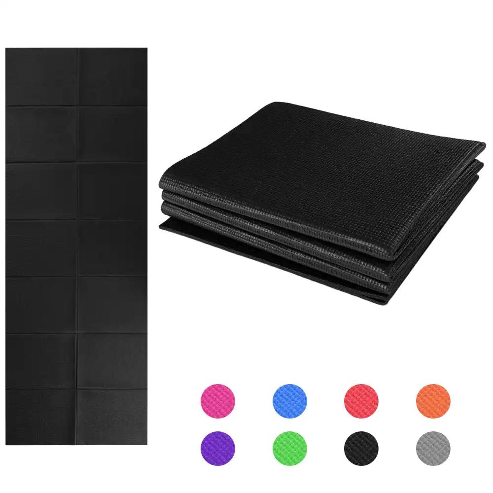 Non-slip foldable yoga mat in black with colorful options, high-density foam for gym and home fitness.