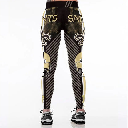 Yoga high waist fitness leggings with black and gold design, featuring team-inspired graphics.