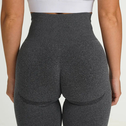 High-waisted gray fitness yoga pants tights made of cotton blend fabric.