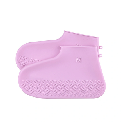 Pink silicone slip-resistant rain boots for men and women, easy to carry for hiking.