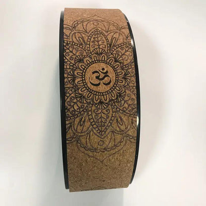 Cork yoga wheel with mandala design for backbend exercises.