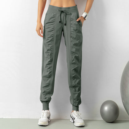 WILKYsPantsFashion Casual Sports Pants For Women Drawstring High Waist Trousers WExperience ultimate comfort and style with our Fashion Casual Sports Pants for Women. Designed with a drawstring high waist, and pockets, these pants are perfect for