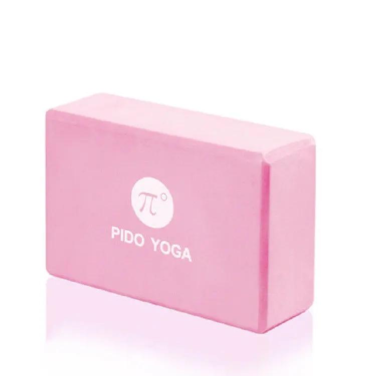 Pink fitness dance aids yoga brick for balance and flexibility.