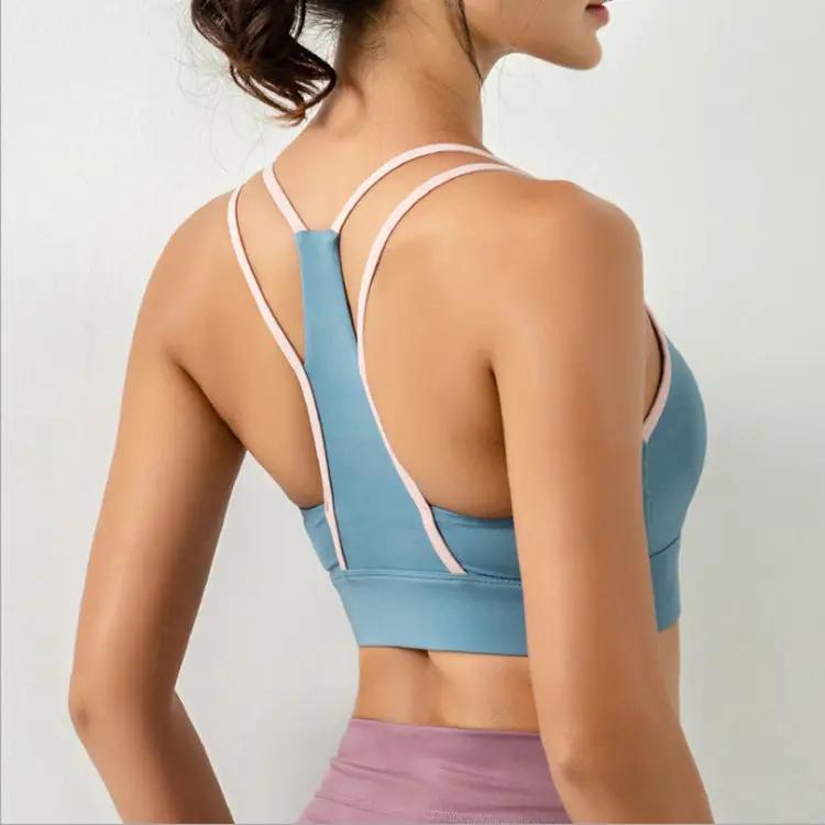 WILKYs0Running bra yoga vest fitness
 Style: Sporty
 
 Design features: color matching, insert
 
 Cup type: full cup
 
 Mold Cup Type: Middle Mold Cup
 
 Color: blue, black
 
 Size: S, M, L
 









