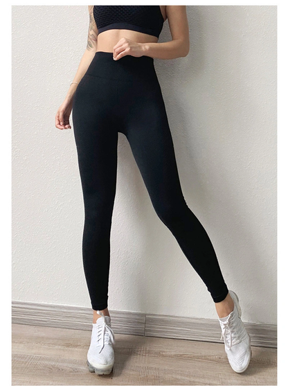 Women's yoga fitness pants in black, designed for comfort and flexibility during workouts, showcasing a sleek, athletic fit.