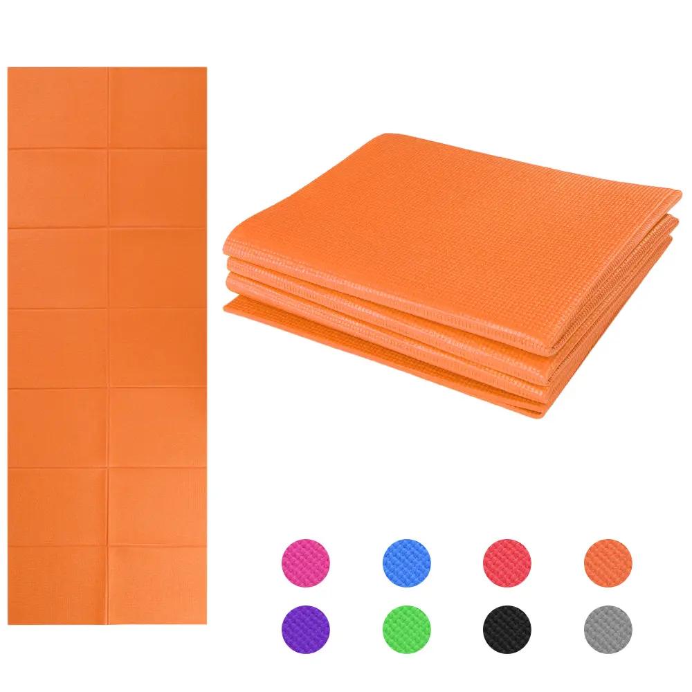 Non slip foldable yoga mat in various colors with cushioning for fitness and gymnastics.