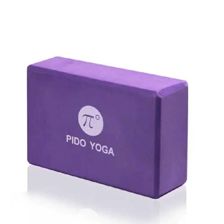 Purple EVA yoga brick for fitness and dance, aids balance and flexibility.