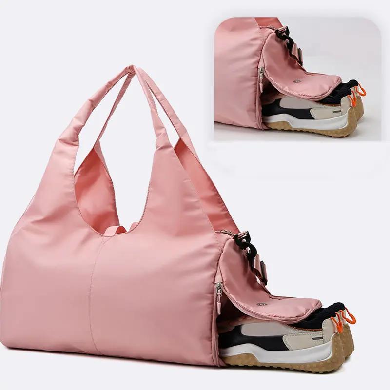 Pink women's yoga bag with wet separation, large capacity for travel and sports, featuring storage space for yoga mats.